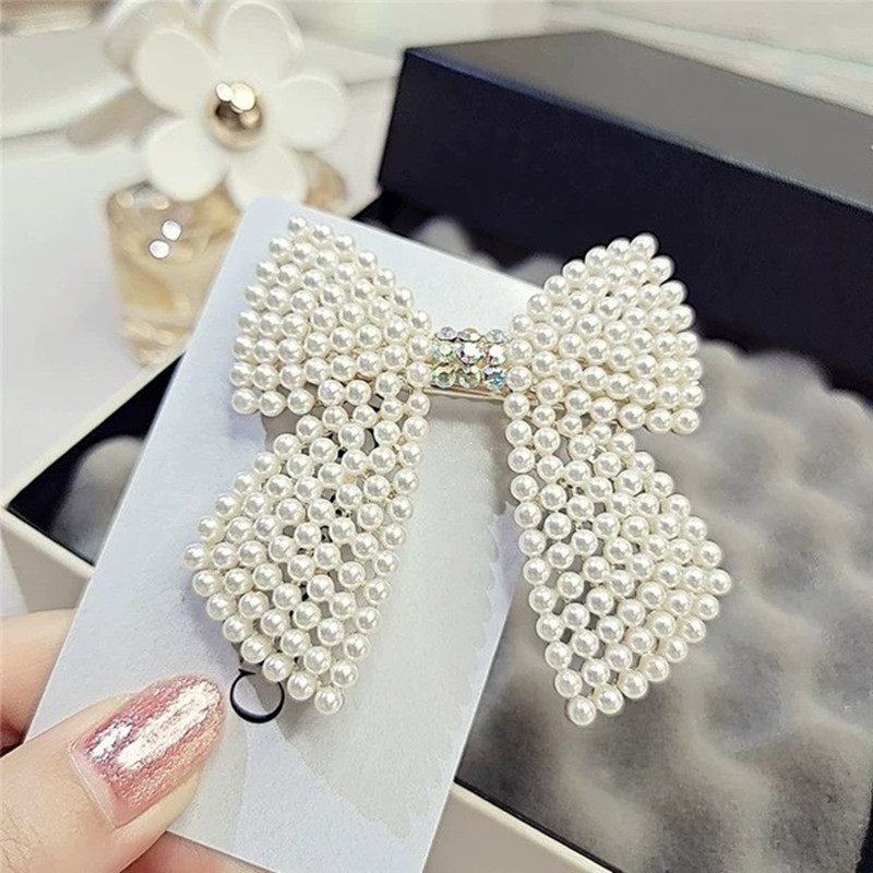 حجر الراين اللؤلؤ القوس مقاطع  - مراجعة Body Jewelry Wholesale وسعره