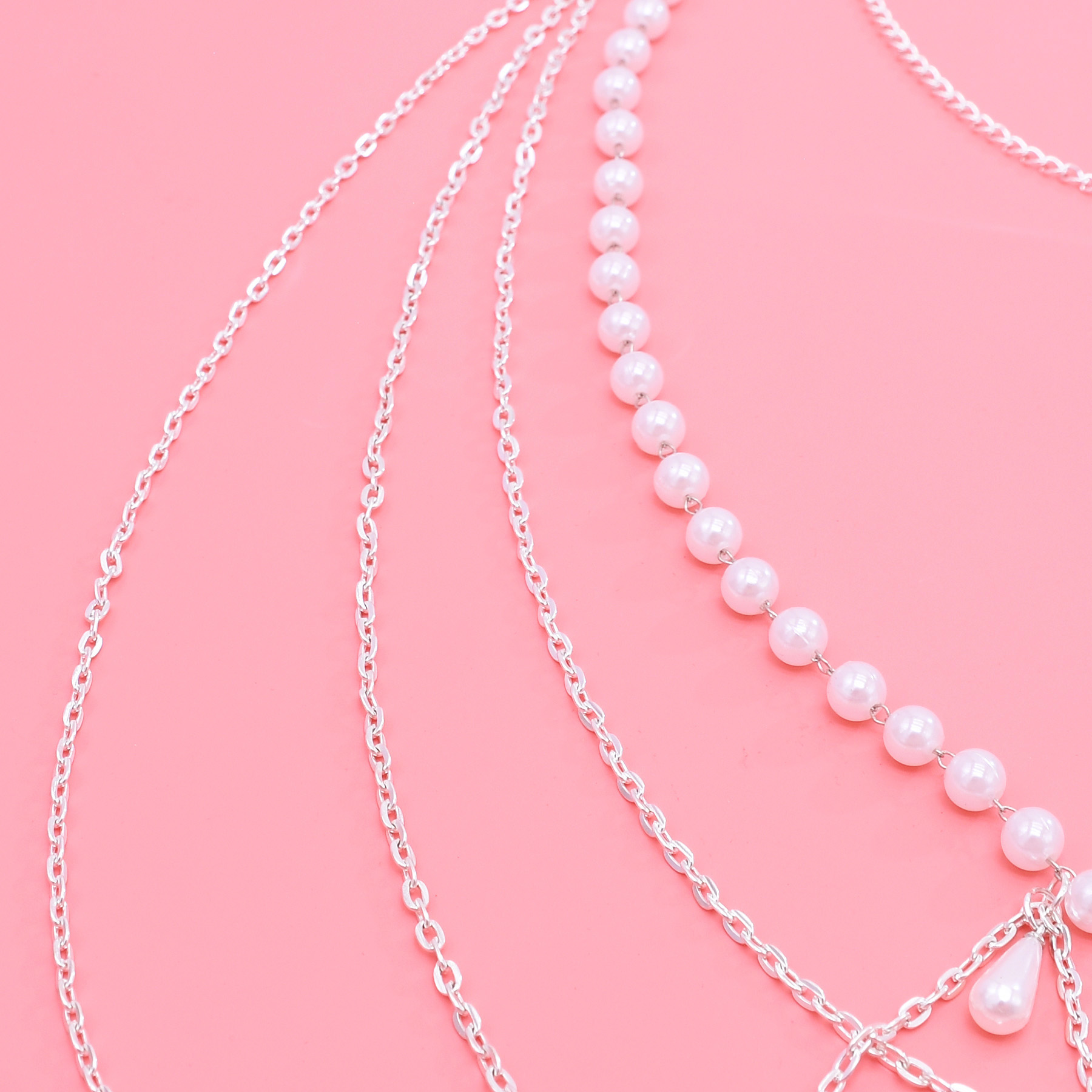 مثير الخصر حزام على شكل سلسلة  - مراجعة Qualiti Body Jewelry وسعره